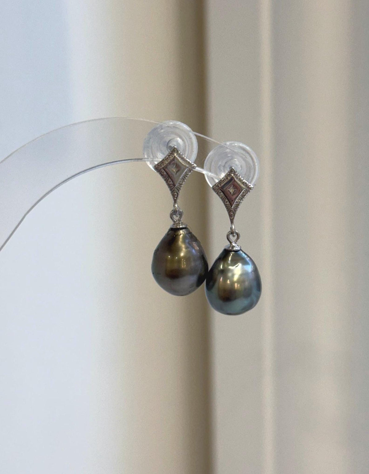 Tahitian pearl drop earrings with peacock green tones and geometric S925 sterling silver studs.
