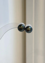 Hunter green Tahitian pearl earrings with mirror luster and geometric S925 sterling silver studs.