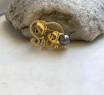 Gold-tone elephant brooch pendant with sparkling clear accents and a genuine saltwater pearl.