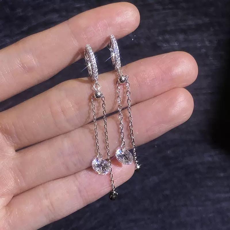 Adjustable chain drop earrings with sparkling round moissanite stones