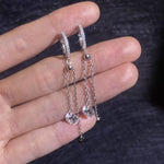 Adjustable chain drop earrings with sparkling round moissanite stones