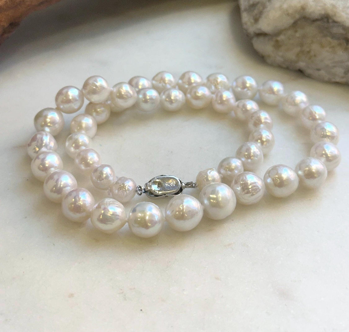 Graduated 7.2–11.2mm freshwater pearls with iridescent shine