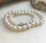 Graduated 7.2–11.2mm freshwater pearls with iridescent shine