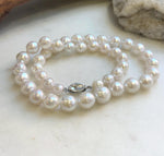 Classic white pearl necklace measuring 17.1 inches long