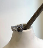 9.4mm Tahitian pearl ring with a black platinum tone and mirror luster