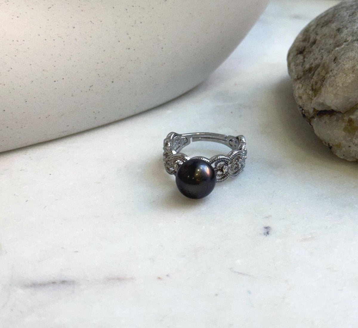 Black platinum Tahitian pearl ring with a lustrous 9.4mm pearl