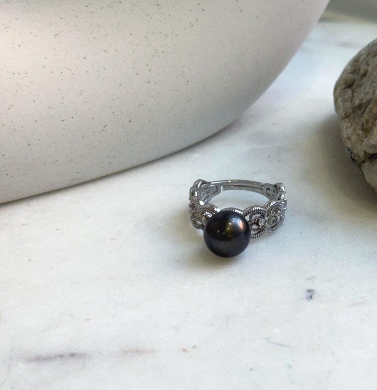 Genuine black platinum Tahitian pearl jewelry ring with a mirror-luster finish