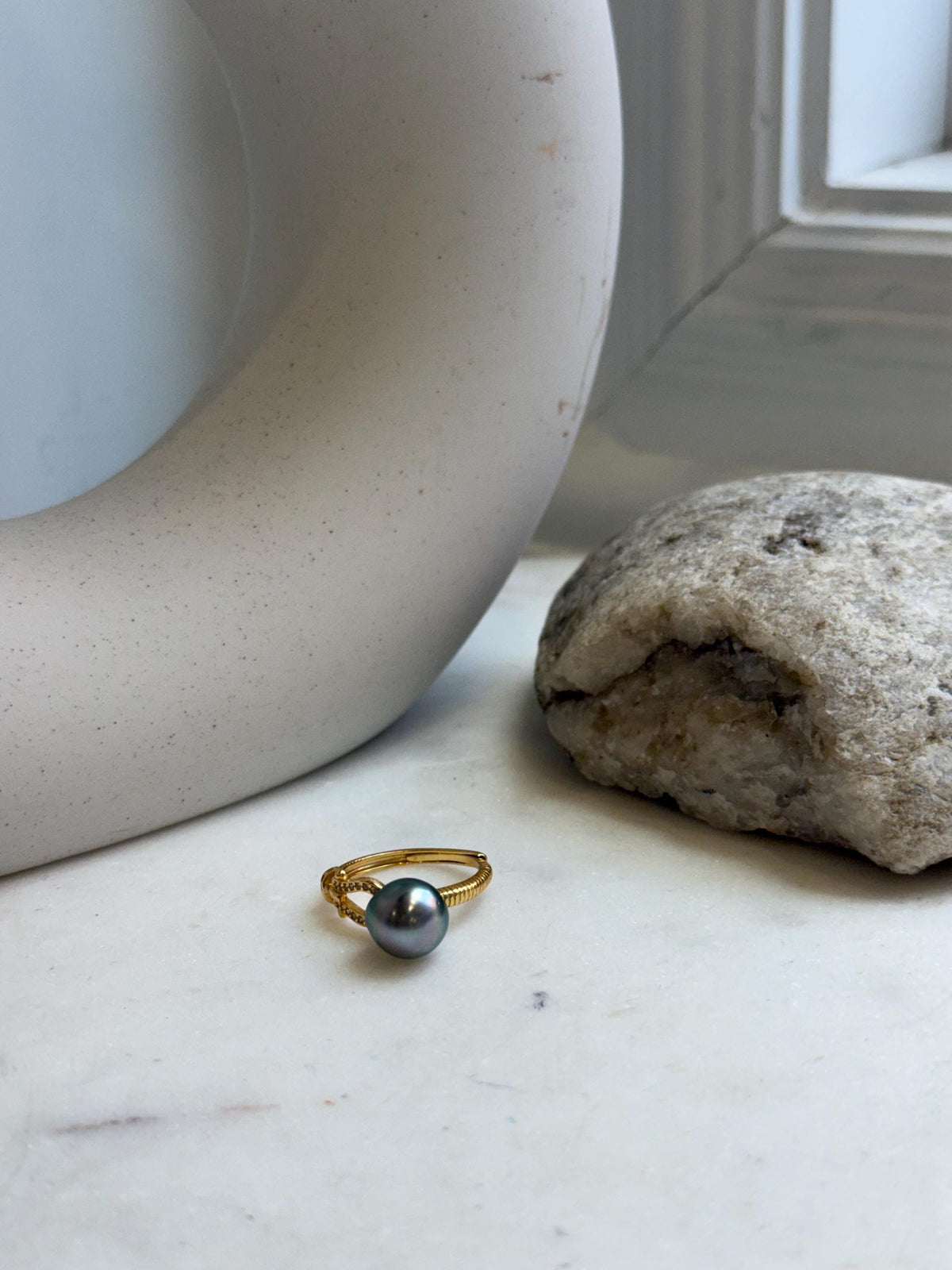 Dark green Tahitian pearl ring with a gold-plated sterling silver setting