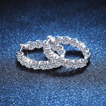 Sterling silver hoops featuring 1.3 carats diamond equivalent of moissanite each.