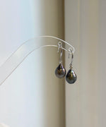 S925 sterling silver hook earrings featuring 9.6mm brown Tahitian pearls.