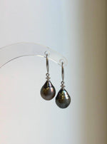 Elly’s Tahitian saltwater pearl earrings with hunter brown pearls and sterling silver hooks.