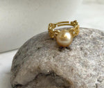 Deep tea-gold South Sea pearl ring with bright luster and a delicate lace-style band in gold-plated S925 sterling silver.