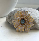 Tahitian hunter blue pearl brooch pendant with an elegant floral design