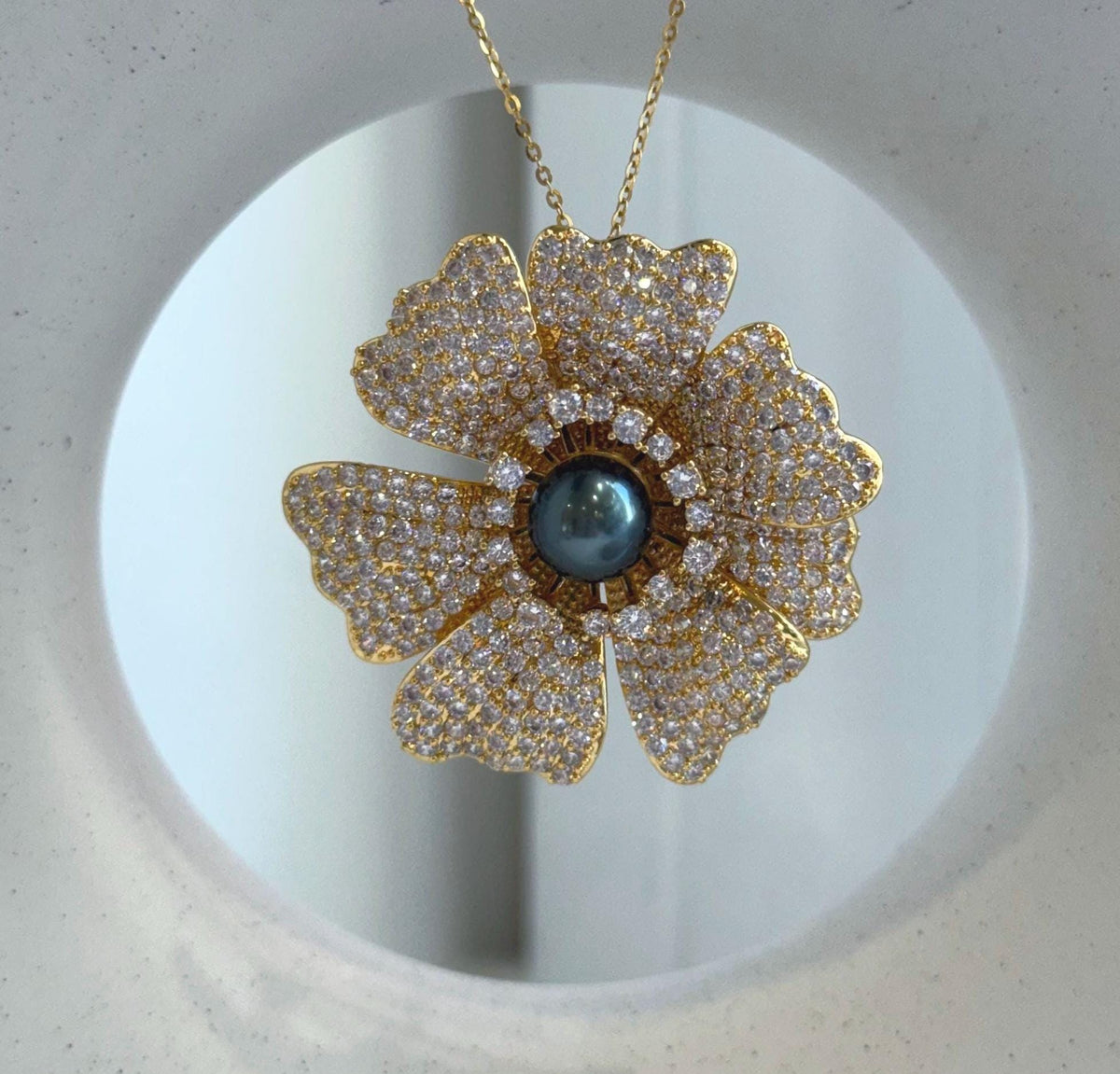 4.5cm floral pearl brooch with a 9mm Tahitian saltwater pearl