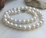 19.1-inch Edison pearl necklace featuring white round pearls measuring 10.1–11.9mm.