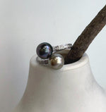 Two 8.7–9.2mm Tahitian pearls set together in an adjustable sterling silver ring.