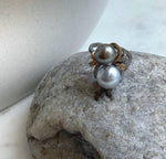 S925 sterling silver floral setting with two Tahitian pearl accents.
