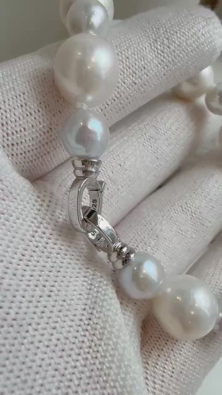 Elly’s 7.6-11.4mm White Pearls Bracelet, Extreme luster mirrored, 8.1” knot, S925 silver bracelet.