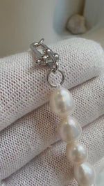 Elly’s 16pcs 7.1-13.1mm Baroque oval pearls Braclet: Extreme luster mirrored, 8”, S925 silver Braclet.