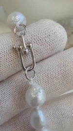 Elly’s 17pcs 8.2-10mm White iridescent crinkle Pearls Bracelet: Extreme luster mirrored, 7.8” knotted, S925 silver Bracelet.