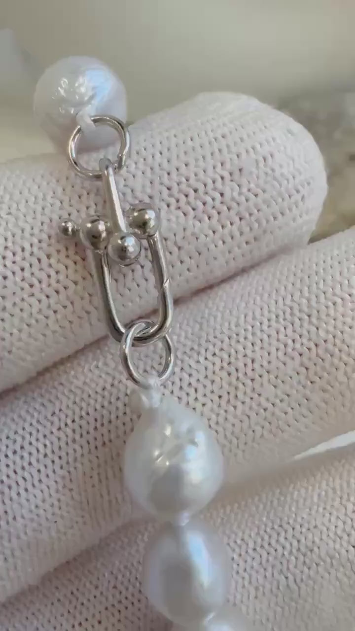 Elly’s 17pcs 8.2-10mm White iridescent crinkle Pearls Bracelet: Extreme luster mirrored, 7.8” knotted, S925 silver Bracelet.