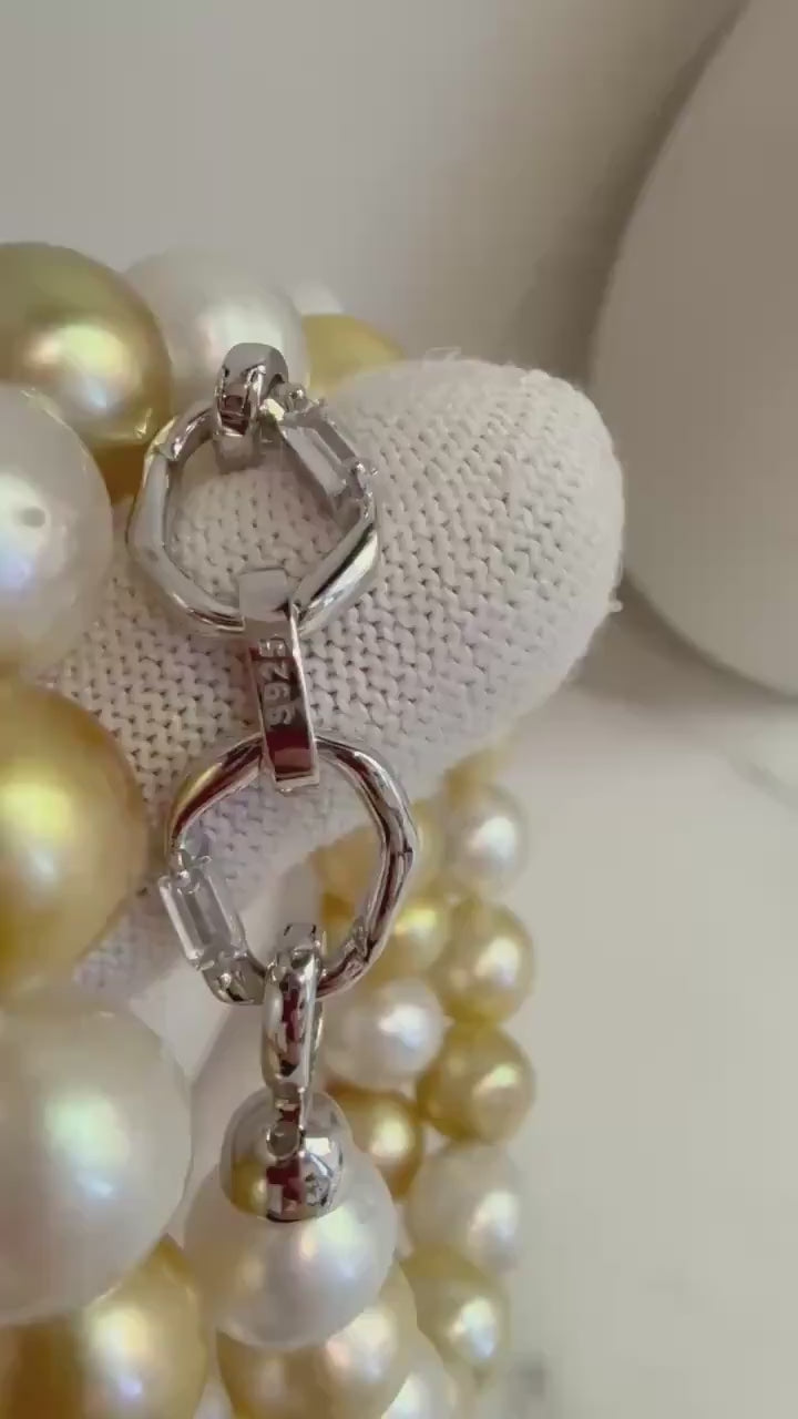 Elly’s 33pcs Strong luster South Sea Golden Australian Ocean White Pearls Necklace Strand: 10.7-12.8mm. Hand knotted 17.3”