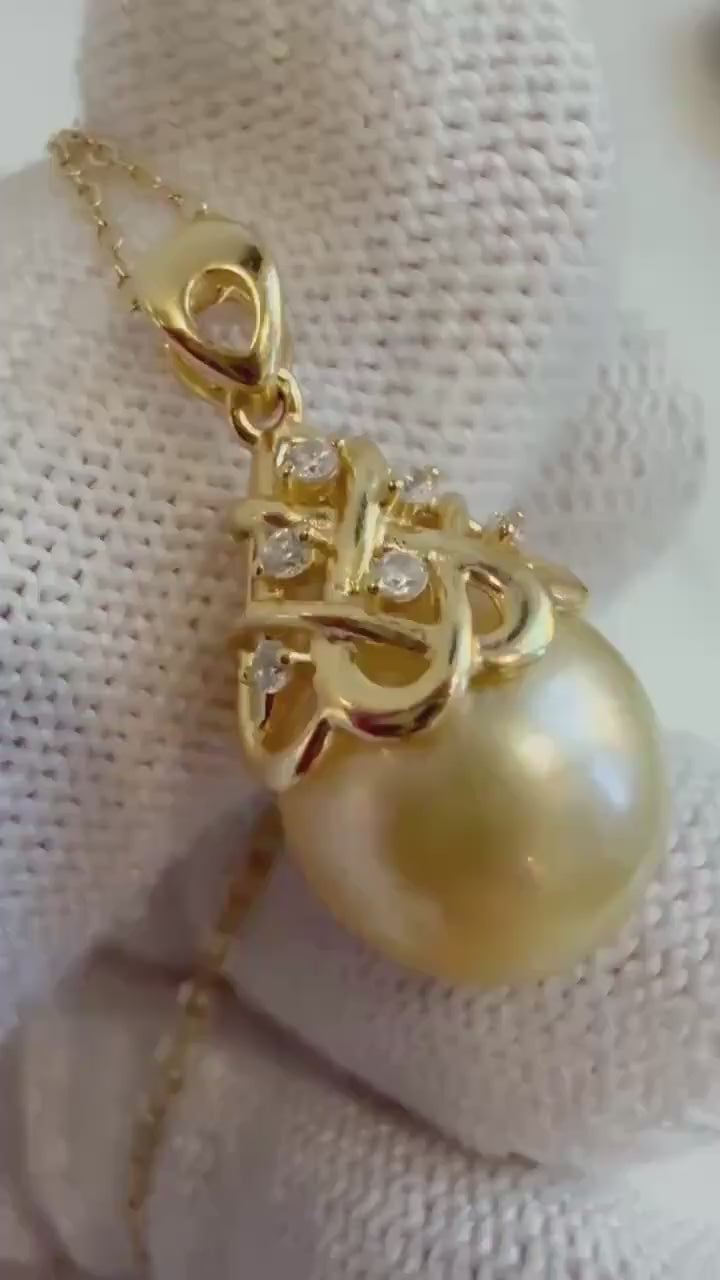 Elly’s 10.8mm South sea golden Pearl Vintage Pendant: Strong luster, 2.3cm high, S925 silver with zircon Pendant with silver chain.