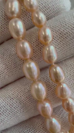 Rare 5.3-6.3mm extremely strong luster peach color genius rice pearls necklace choker elegant attractive anniversary gift for her. Handknot
