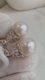 Elly’s 11.7mm strong luster natural Freshwater white pearls fancy s925 silver earrings. Daily earrings.