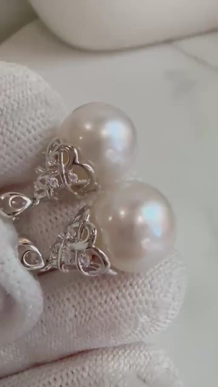Elly’s 11.7mm strong luster natural Freshwater white pearls fancy s925 silver earrings. Daily earrings.