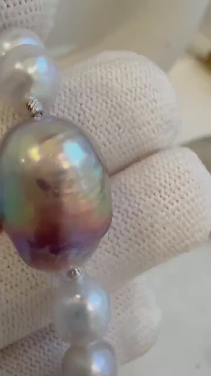 Elly’s 8-14.6mm White metallic rainbow iridescent Pearls Bracelet: Extreme luster mirrored, 8.5” knotted, S925 silver Bracelet.