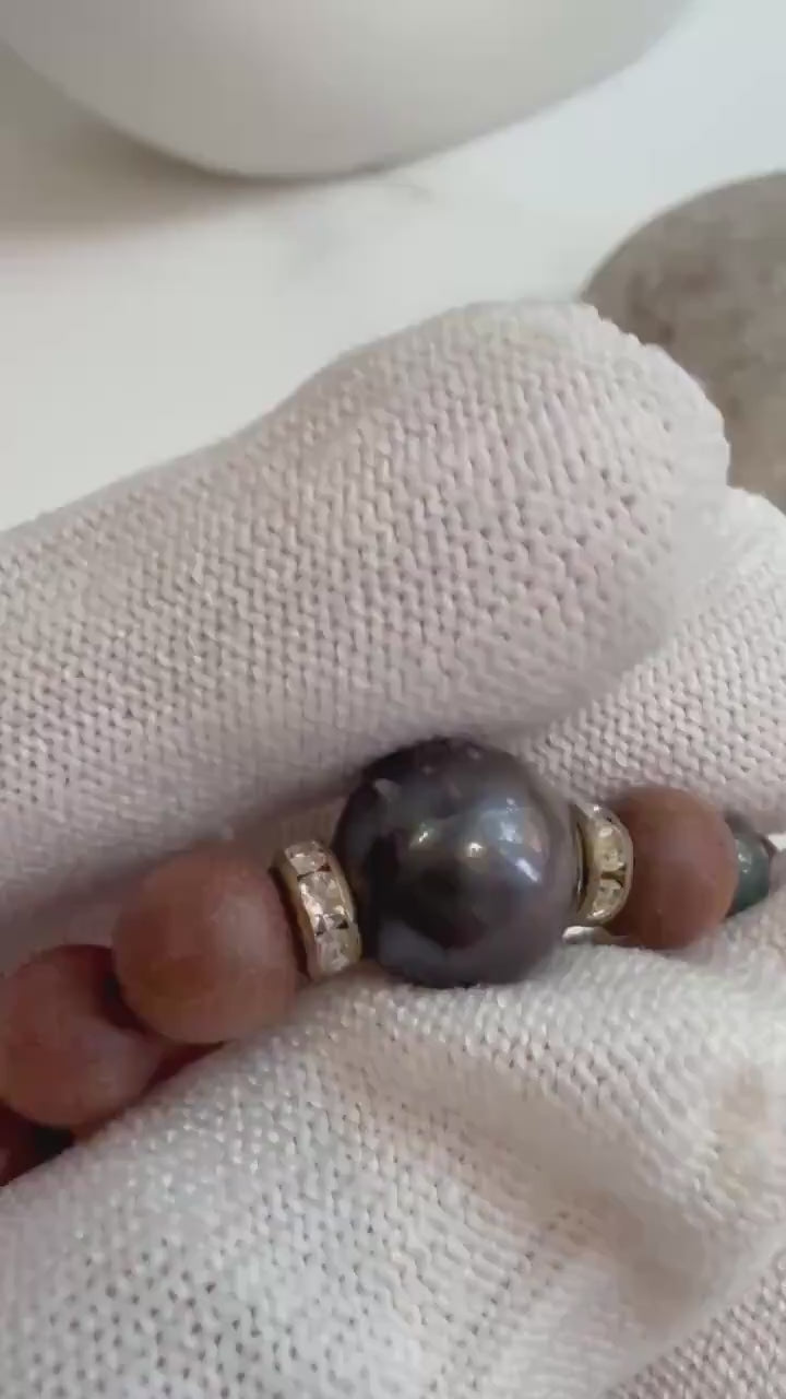 Elly’s 11mm Tahitian Ocean Saltwater Elegant Plum Black Pearl Sandalwood elastic daily bracelet.