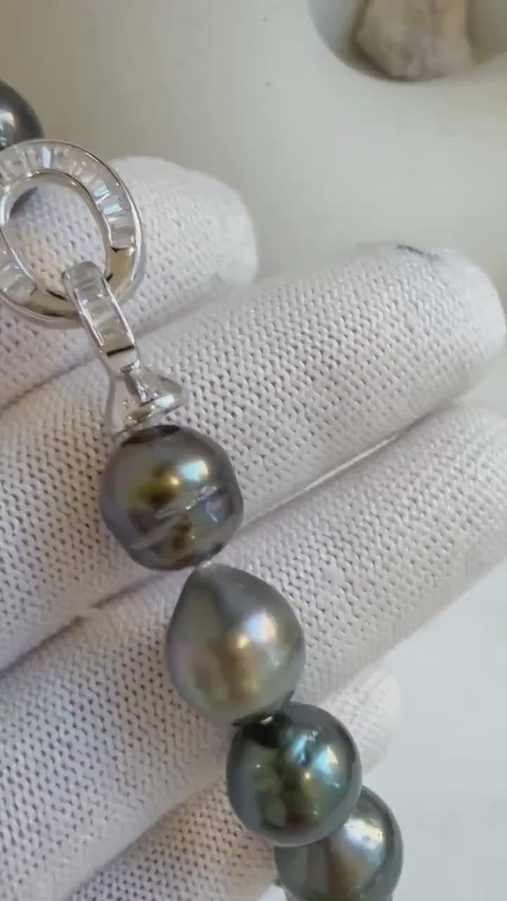 Elly’s 10.1-11.7mm 14pcs Tahitian Ocean peacock green huber Pearls Bracelet: Extreme luster, 8.1” knotted. Pearl jewelry idea.