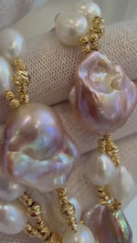 Elly’s Baroque Rice Keshi Pearls Designed Necklace: 9pcs Extreme luster, peach rose iridescent, to 24mm, 18.3”