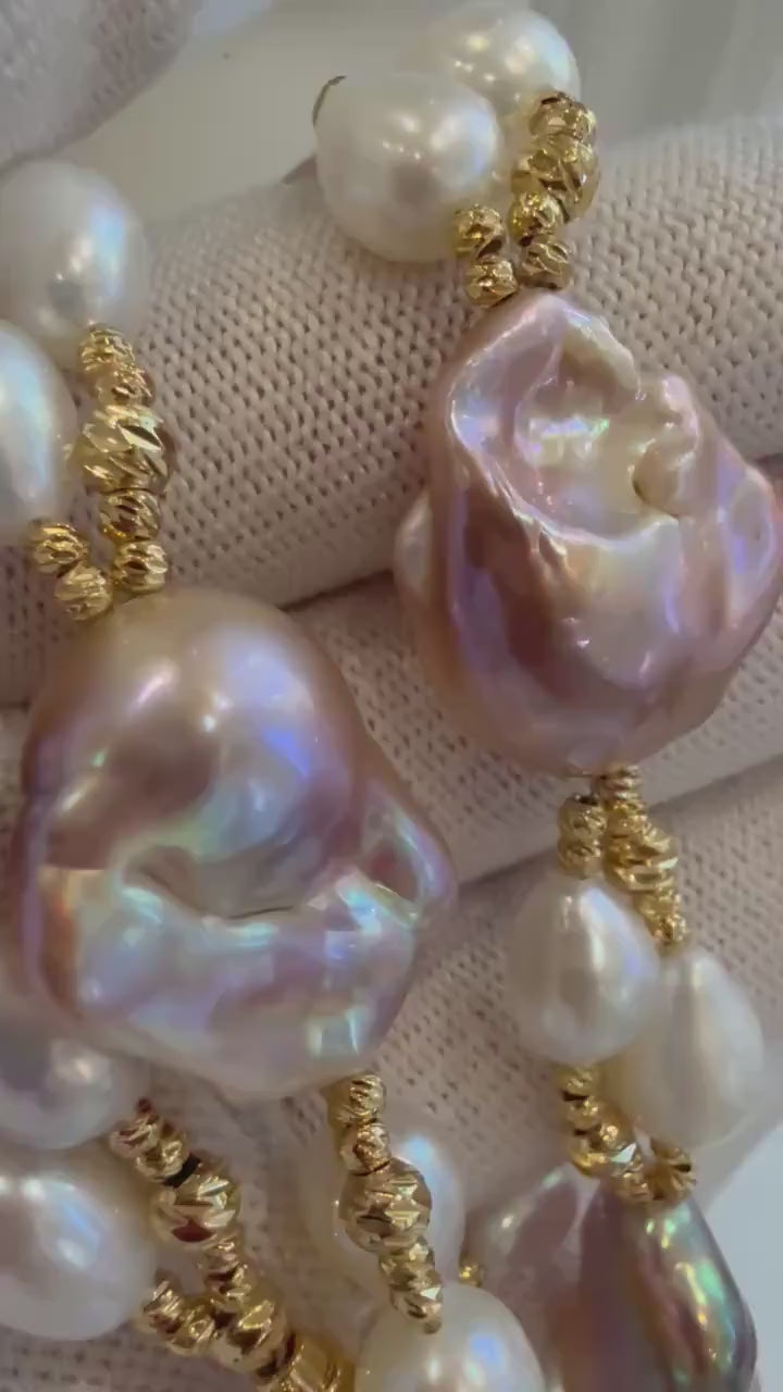Elly’s Baroque Rice Keshi Pearls Designed Necklace: 9pcs Extreme luster, peach rose iridescent, to 24mm, 18.3”
