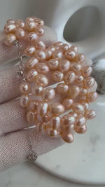 Elly’s Peach Freshwater Pearl Necklace: Rice Pearls, Strong Luster (16.9")