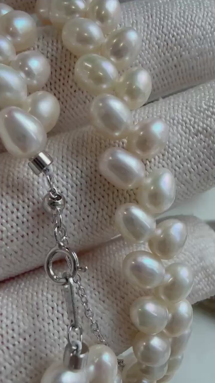 Elly’s White rice Keshi Pearls wheat design Necklace: Extreme luster Mirrored effect, 5-5.5mm, S925 silver clips, to 17.7”long.