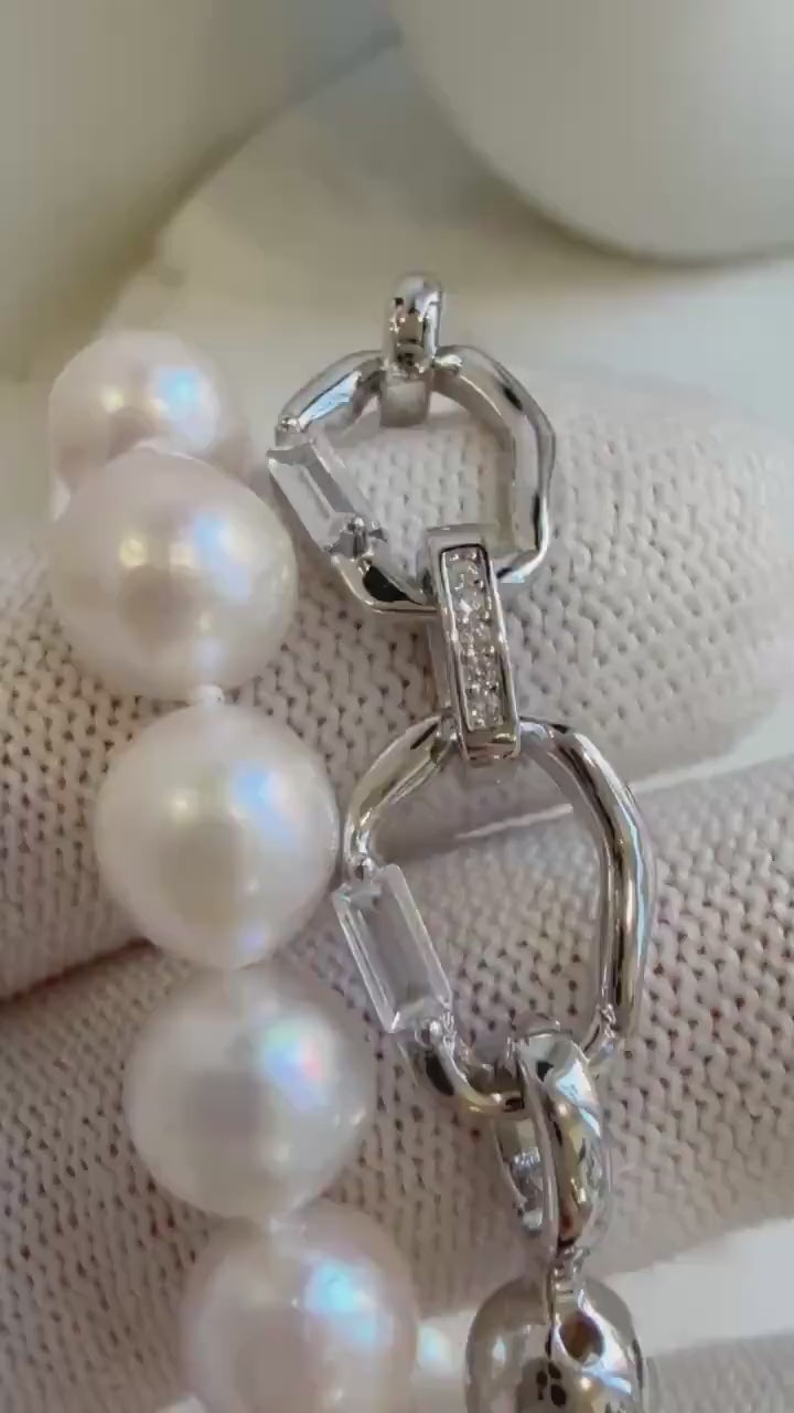 Elly’s 7.7-8.7mm 47pcs Akoya Ivory w/pink hue ocean pearls necklace choker: Extreme luster mirrored, knotted, 18.2”, S925 silver necklace.