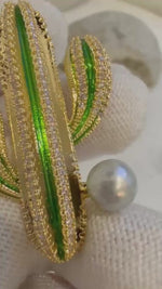 Elly’s Akoya ocean pearl Cactus brooch: Extreme luster mirrored, 7.1mm, Blue silver.