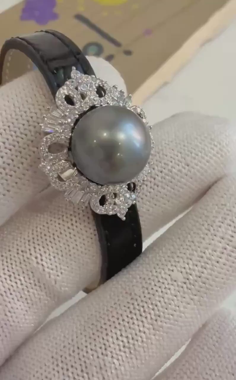 Elly’s Tahitian Ocean Pearl Genius Leather Strap Bracelet: 11.6mm extreme luster mirrored Platinum pearl, for 6.1”- 8” wrist.